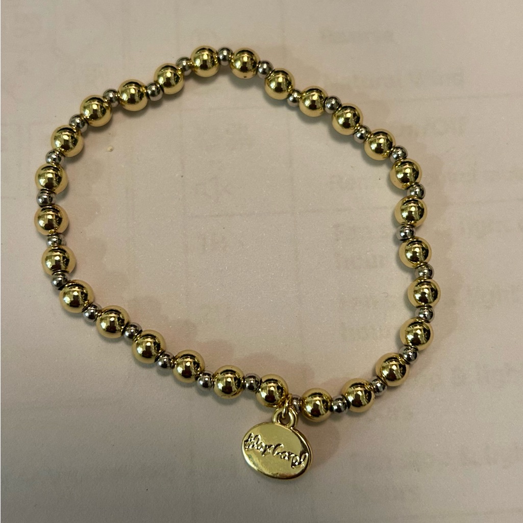 Gold And Silver Beaded Bracelet With Charm